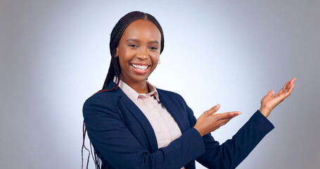 Portrait, business woman and presentation of space, mockup or announcement of promotion in studio...