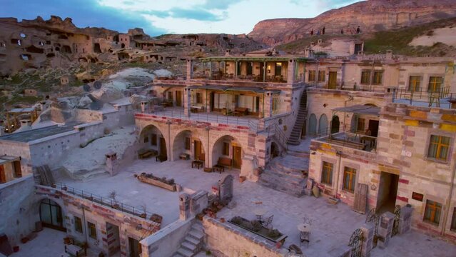 Drone view of city in cappadocia at sunset