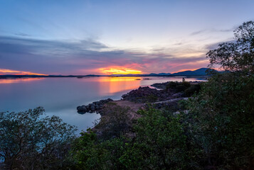 lake at sunset,  near gaborone capital city of Botswana, african landscapes, elevated view from the island in late afternoon