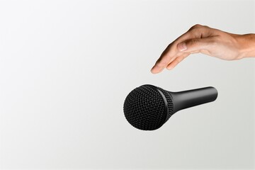 Human hand with microphone