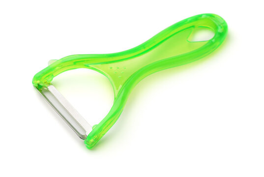 Green plastic vegetable peeler