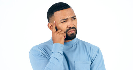 Fototapeta premium Hands, thinking and confused man in studio with brainstorming, ask or guess gesture on white background. Doubt, face and male model with questions, why or unsure body language, emoji or solution