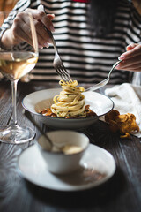 Fototapeta na wymiar Appetizing Italian pasta with mushrooms. Food photography. Stylish serving of food.