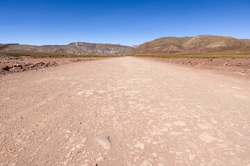 Traveling the famous Ruta40 in the scenic Argentinian highlands - fantastic views while driving through colorful and remarkably shaped mountains and watching wildlife in high altitude in South America