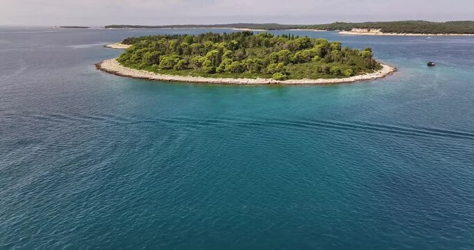 Drone pan over Brijuni islands in front of Pula in Istria in summer