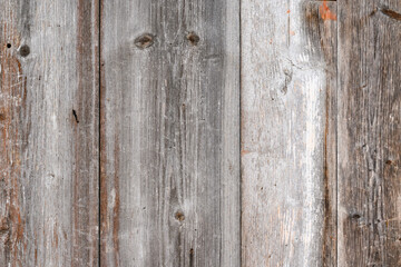 The background of the wall with the texture of boards painted with gray paint