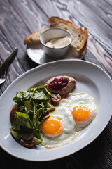Hearty lunch, healthy food, beautiful presentation of food on a dark wooden background. Food photography.