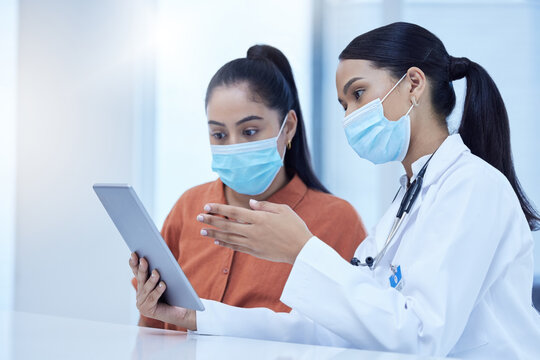 Covid, Consulting And Patient, Doctor And Tablet With Results, Diagnosis And Online Medical Report. Healthcare, Covid 19 And Women In Doctors Office With Face Mask, Digital Tech And Analysis