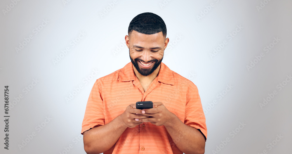 Poster Man, smartphone and chat online with social media and communication in studio on white background. Smile at text, email notification and scroll internet with typing, mockup space and using phone