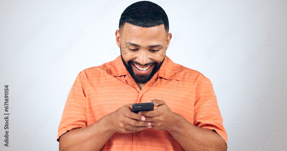 Poster Man in studio with phone, smile and typing with connection for networking, online chat or communication. Good news, notification and happy person writing message, email or post on white background.