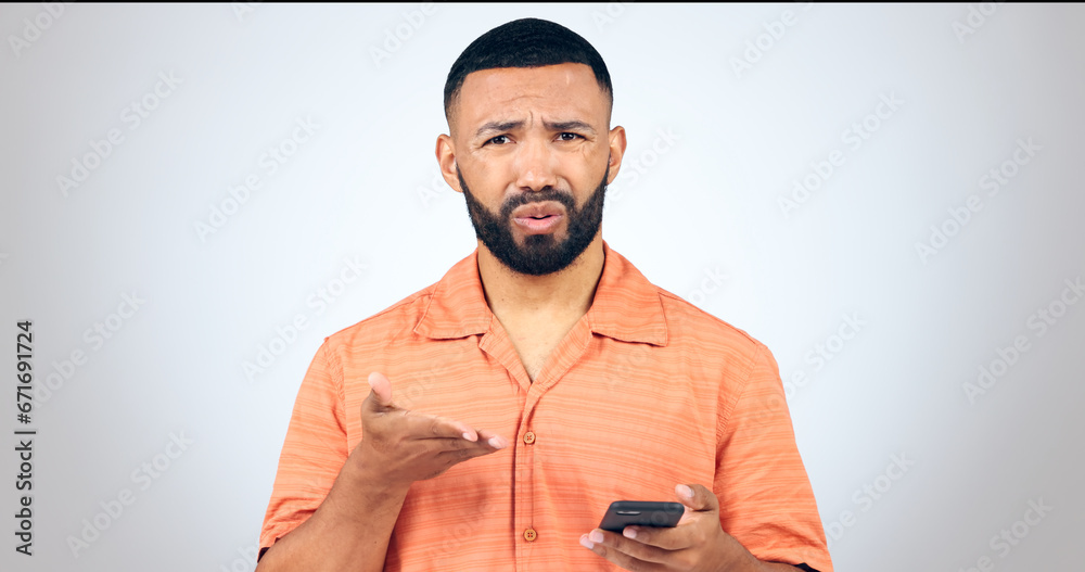 Aufkleber portrait of man in studio with phone, frustrated and confused with connection problem, 404 or glitch