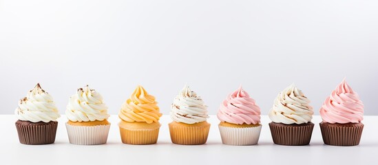 Cream cheese filled cupcakes prepared for immediate consumption - obrazy, fototapety, plakaty
