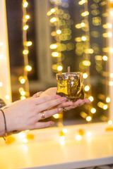 person holding a glass of champagne