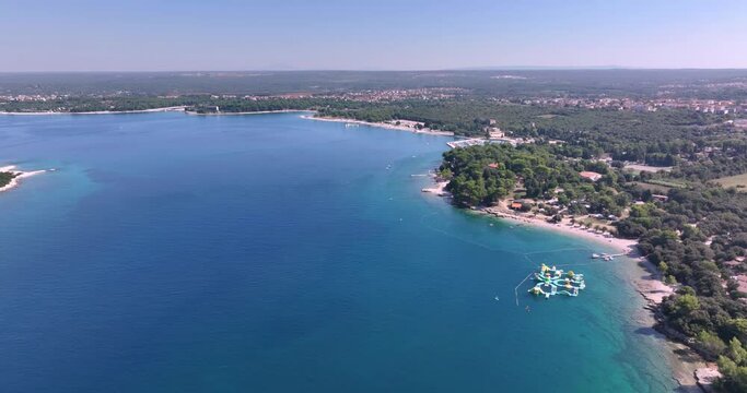 Drone pan over Brijuni islands in front of Pula in Istria in summer