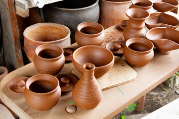 Exhibition of pottery. Pottery. Set of clay pots. The ancient art of making pottery.