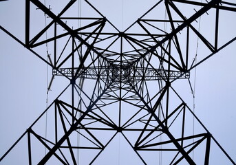 A transmission tower shot from the bottom. Electricity supply concept. 