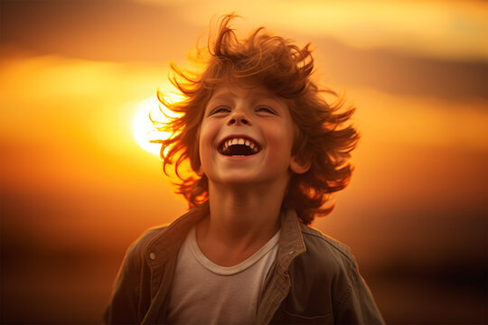 sunset portrait of a happy laughing child, happiness