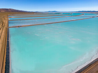 Aerial view of lithium fields / evaporation ponds in the highlands of northern Argentina, South America - a surreal, colorful landscape where batteries are born