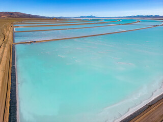 Aerial view of lithium fields / evaporation ponds in the highlands of northern Argentina, South America - a surreal, colorful landscape where batteries are born