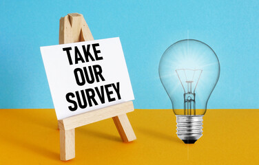 Take Our Survey is shown using the text and photo of light bulb