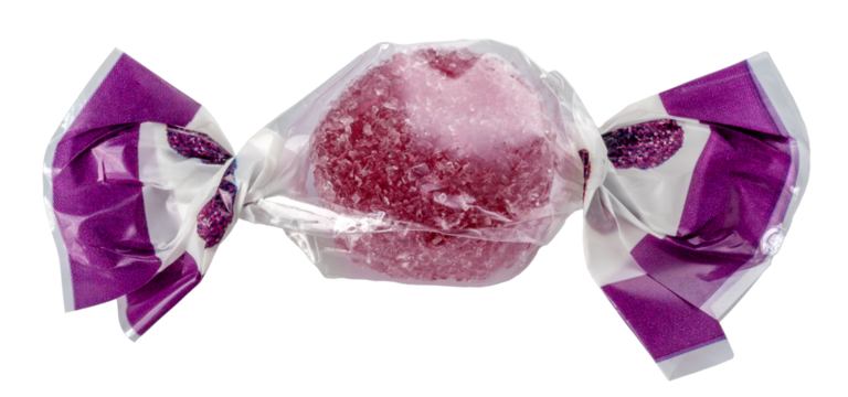 Candy wrapped with transparent paper, blackberry-flavored fruit jelly candy, isolated
