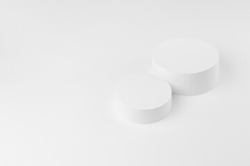 Abstract white scene with two cylinder podiums template for presentation cosmetic products, goods, advertising, design, poster, text, card. White stage template soft light contemporary minimal style.