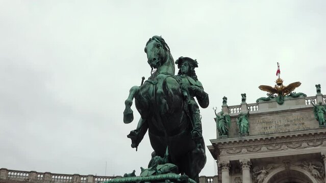 The footage zooms in on the Prince Eugene Monument, showcasing the intricate details of the statue and the surrounding architecture in stunning clarity.