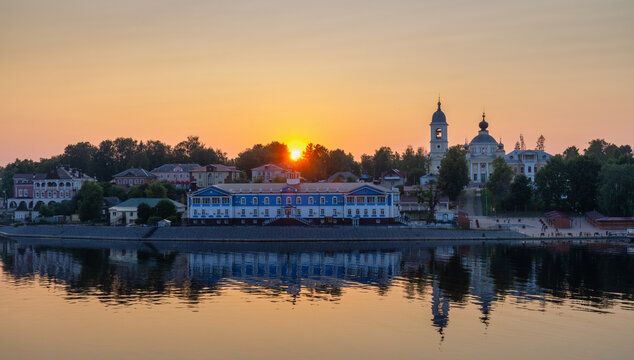 The embankment of the city of Myshkin on the Volga River at sunset