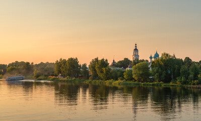 View of the Tolga Monastery from the Volga River during sunset