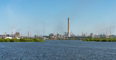 Obraz premium Cherepovets Metallurgical Plant, view from the Sheksna River