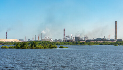 Fototapeta premium Cherepovets Metallurgical Plant, view from the Sheksna River