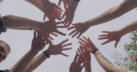 Team conducts a pre-game ritual as a means to enhance their collective spirit and unity. This ritual involves unique hand movements and gestures that hold significance for the team members. 