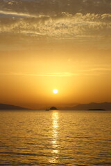 sunset on the beach. Seaside town of Turgutreis and spectacular sunsets. Selective Focus.