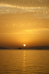 Naklejka premium sunset on the beach. Seaside town of Turgutreis and spectacular sunsets. Selective Focus.