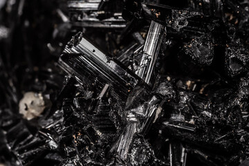 Tourmaline black crystals. Gems. Mineral crystals in the natural environment. Texture of precious...