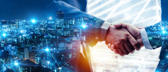 Partnership. double exposure image of investor businessman handshake with customer partner and...
