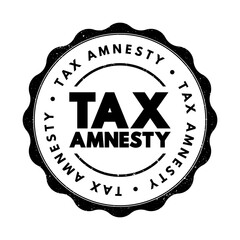 Tax Amnesty - opportunity for people who owe back taxes to pay some or all of what they owe, text concept stamp
