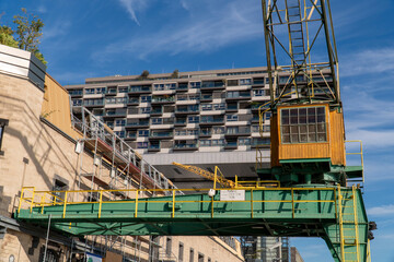 Fototapeta premium Cargo crane near the Kranhaus business center on a sunny morning