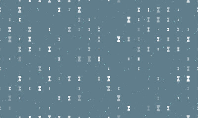 Seamless background pattern of evenly spaced white hourglass symbols of different sizes and opacity. Vector illustration on blue grey background with stars