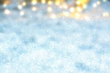 Abstract blurred festive winter christmas or Happy New Year background with shiny blue and white bokeh lighted snow landscape. Space for your design. Card concept.