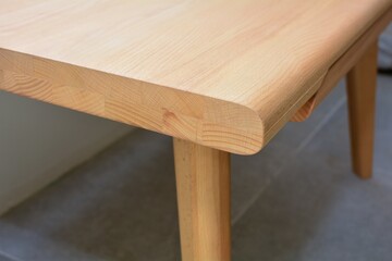 Wooden table surface. Natural wood furniture close view photo background