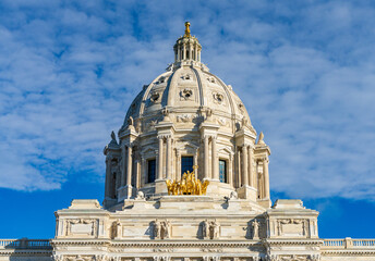Front view of the dome and gold Quadriga statue of the Capitol building in the state of Minnesota...