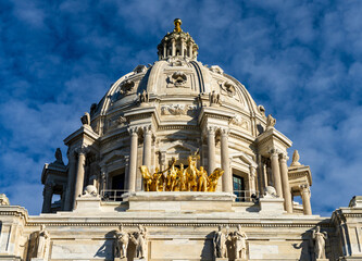 Front view of the dome and gold Quadriga statue of the Capitol building in the state of Minnesota...