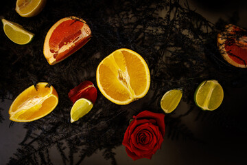 Slices of various citrus fruits.