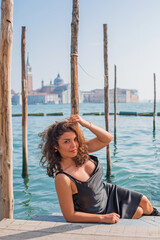Latina woman on vacation in Venice city in Italy. Holidays and vacation concept