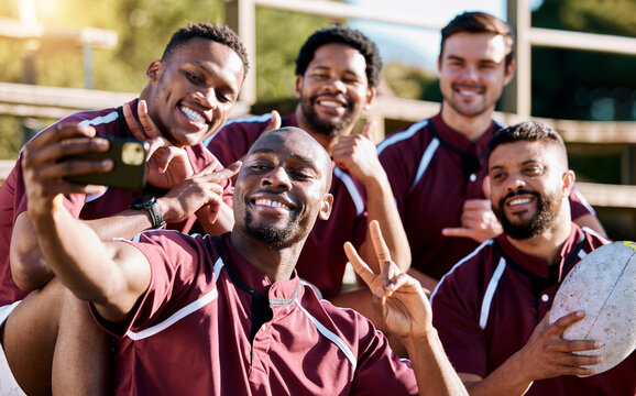 Selfie, rugby team and men with phone smile ready for exercise, sports training and workout on field. Fitness, teamwork and athletes take picture on smartphone for post before match, game or practice