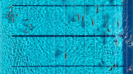Aerial drone top down turquoise crystal clear pool used for sports or competition