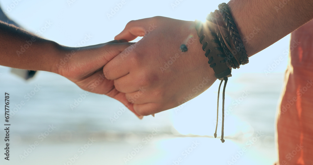 Sticker Love, zoom and couple holding hands at a beach with respect, gratitude and trust in nature together. Commitment, closeup and people together at sea with support, kindness and summer travel freedom