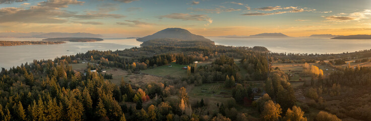 Aerial sunset view of the south end of Lummi Island, Washington. Fall color dominates the landscape...