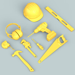 Top view of monochrome construction tools for repair on grey background